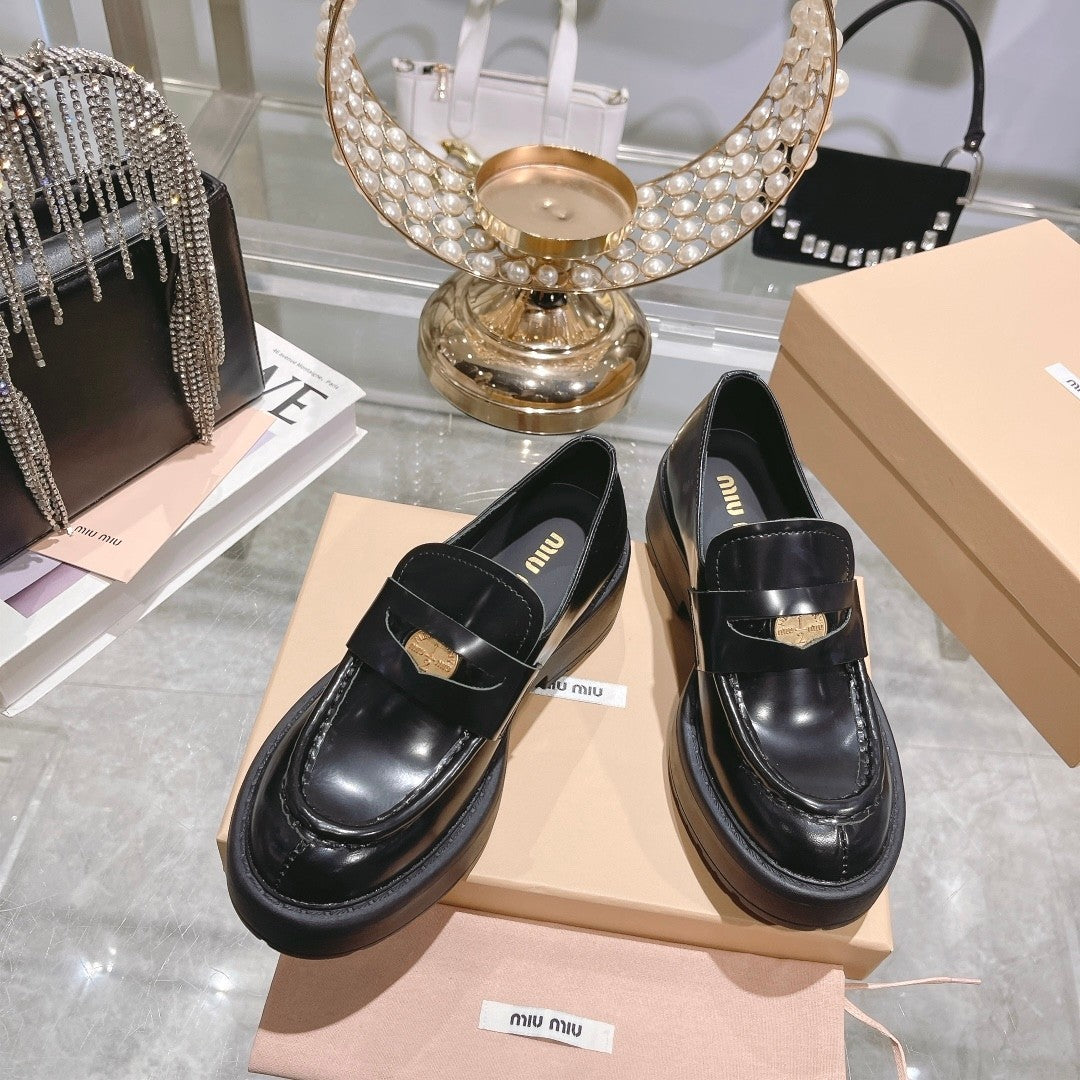 M 24 Coin-embellished platform loafers