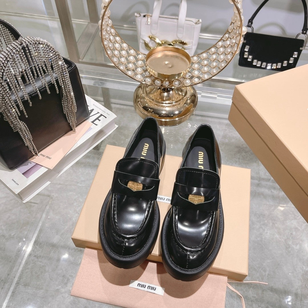 M 24 Coin-embellished platform loafers