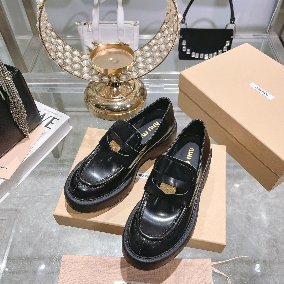 M 24 Coin-embellished platform loafers