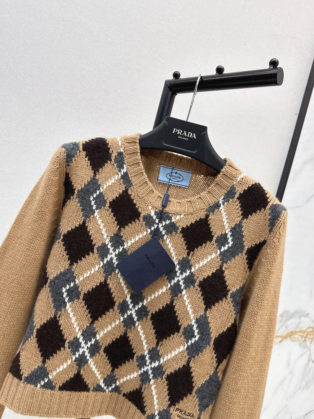 25 College style diamond plaid long sleeved sweater