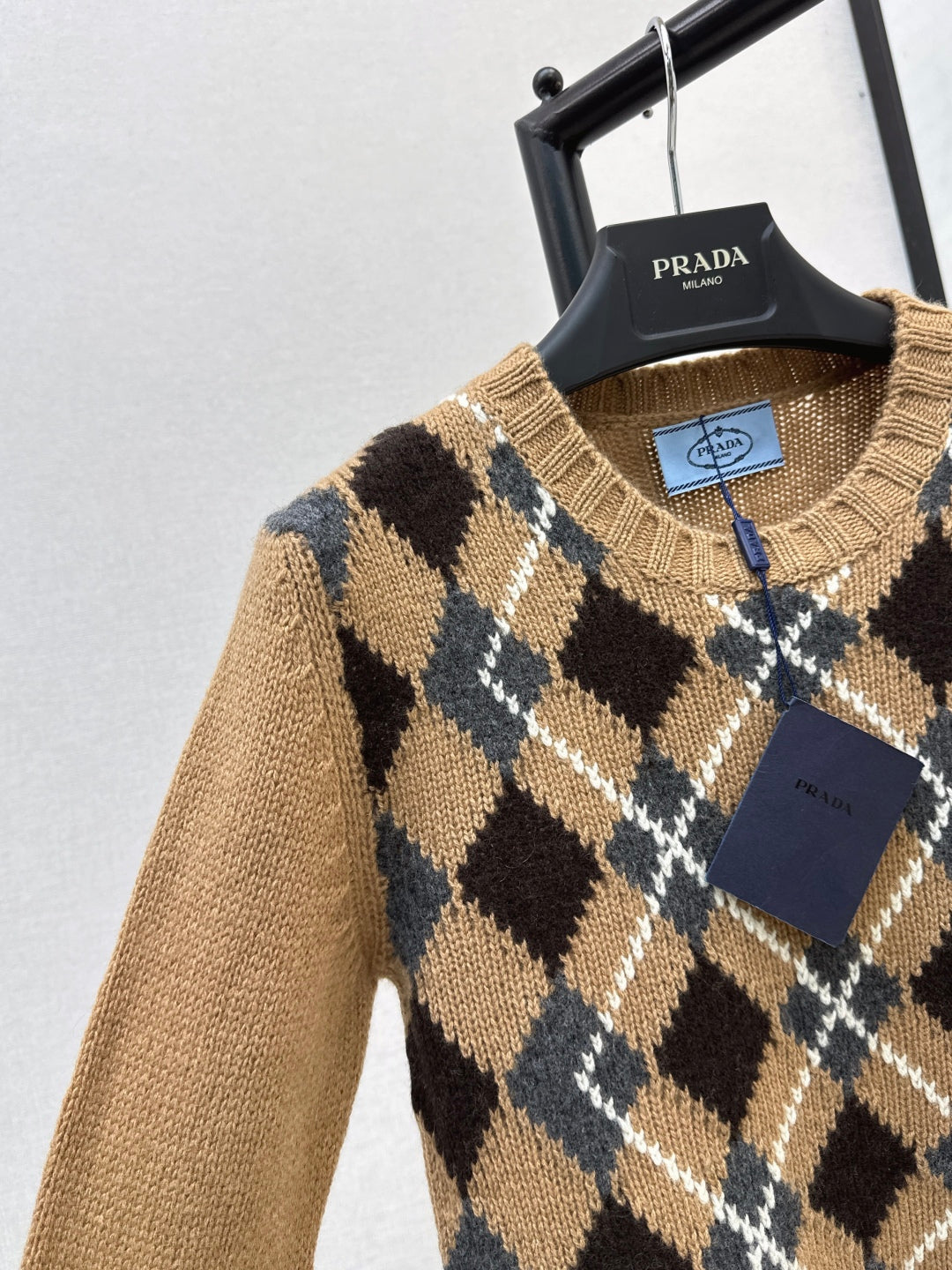 25 College style diamond plaid long sleeved sweater