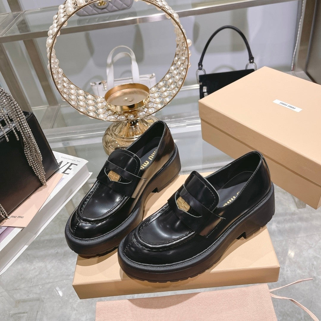 M 24 Coin-embellished platform loafers