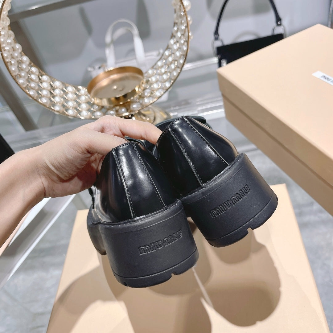 M 24 Coin-embellished platform loafers