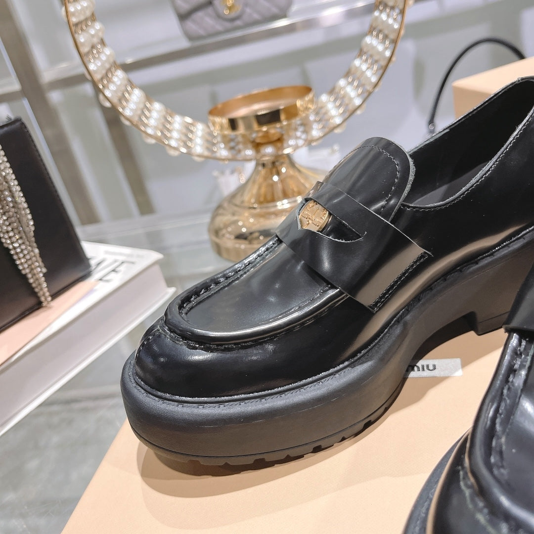 M 24 Coin-embellished platform loafers