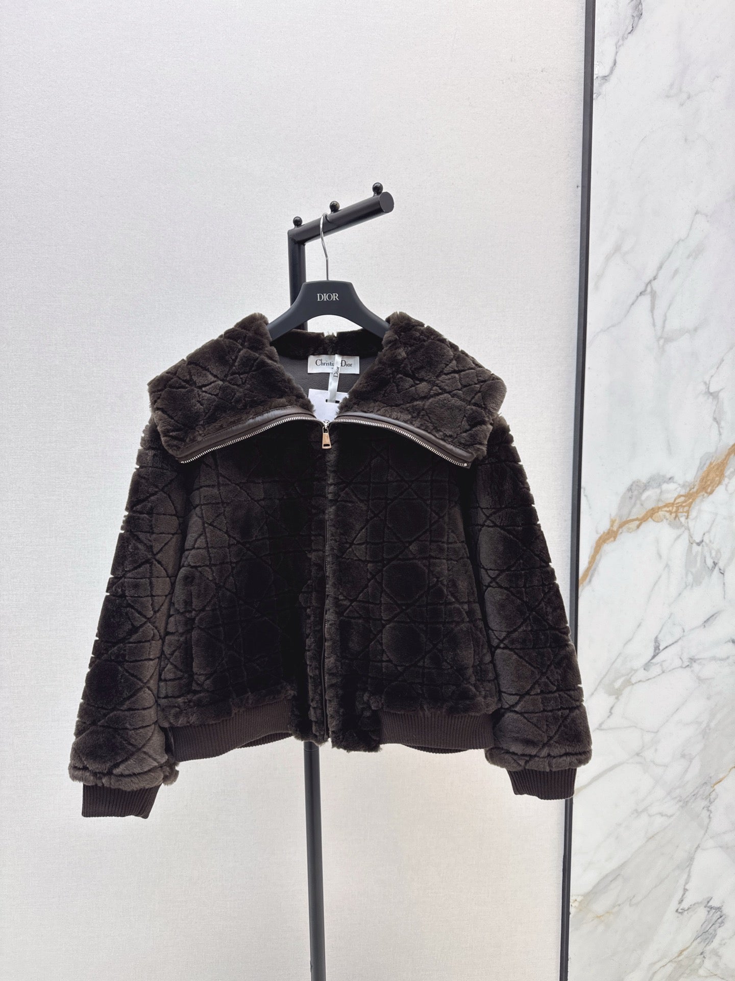 Check fur coat with large lapels