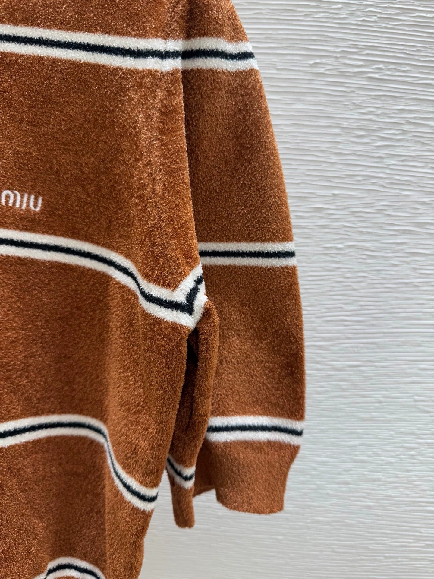 25 stripe sweater