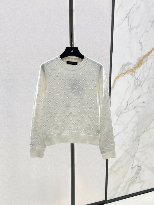 25 Embroidered jacquard sweater
