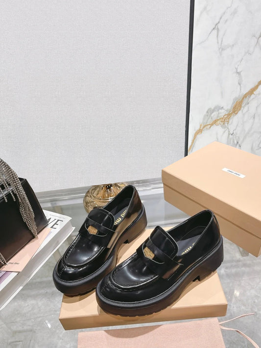 M 24 Coin-embellished platform loafers