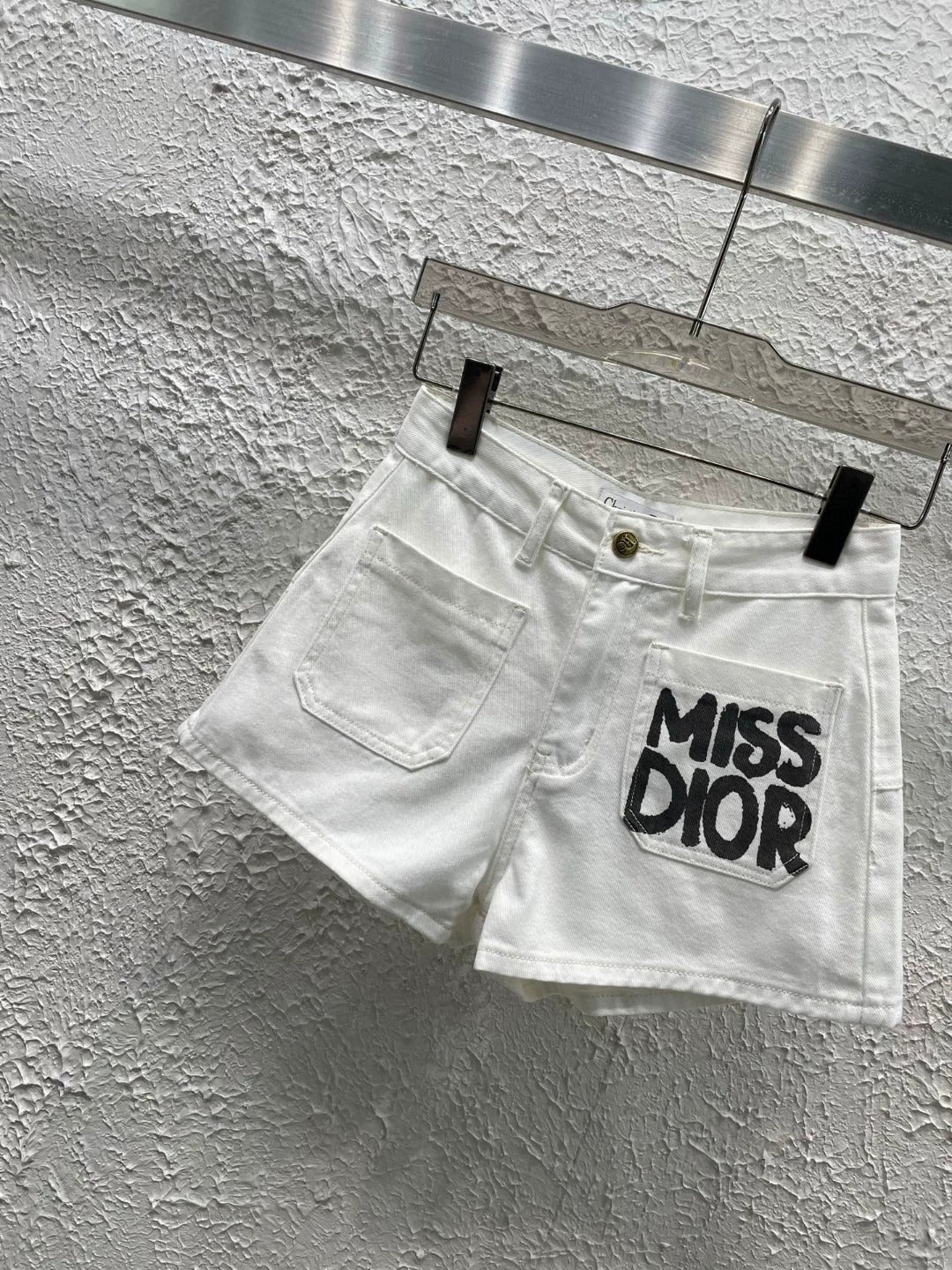 25 letter white shorts