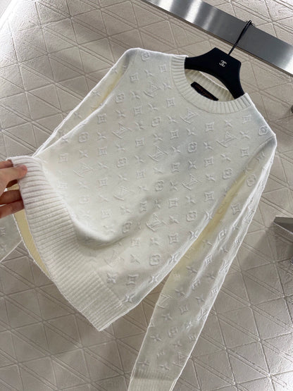 25 Embroidered jacquard sweater
