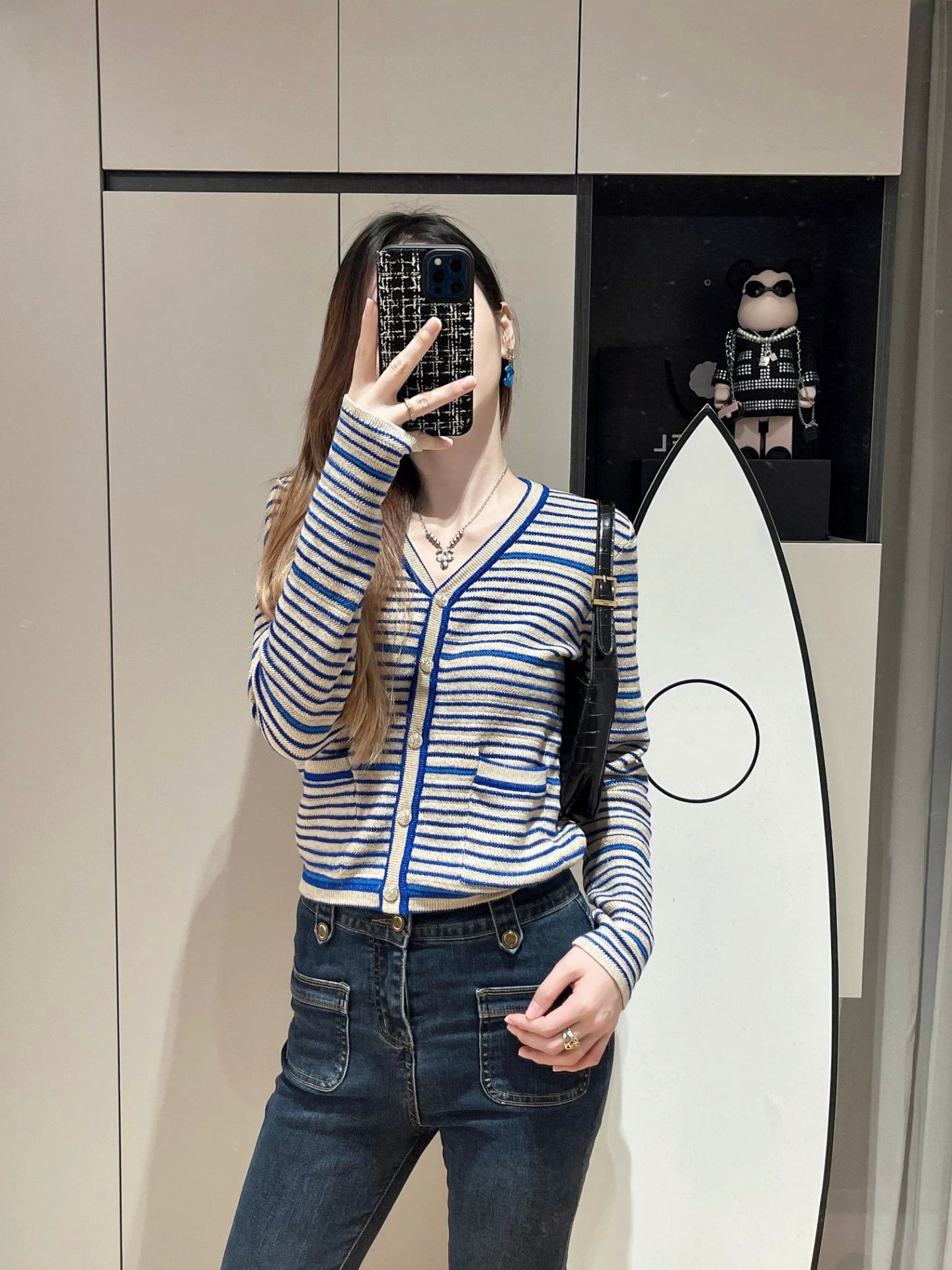 25 Blue and white striped cardigan
