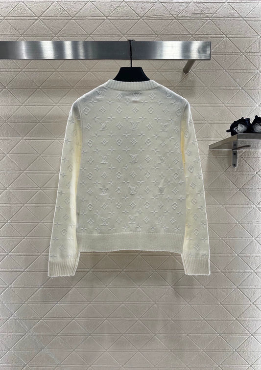 25 Embroidered jacquard sweater