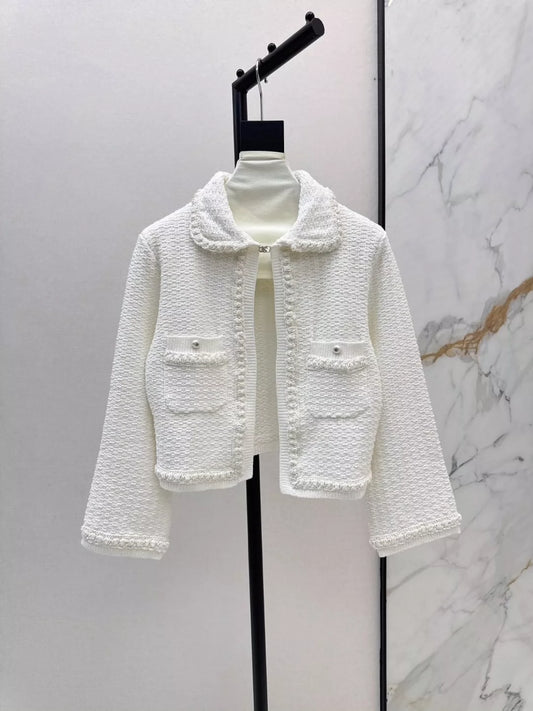 25 Knitted cardigan + skirt set