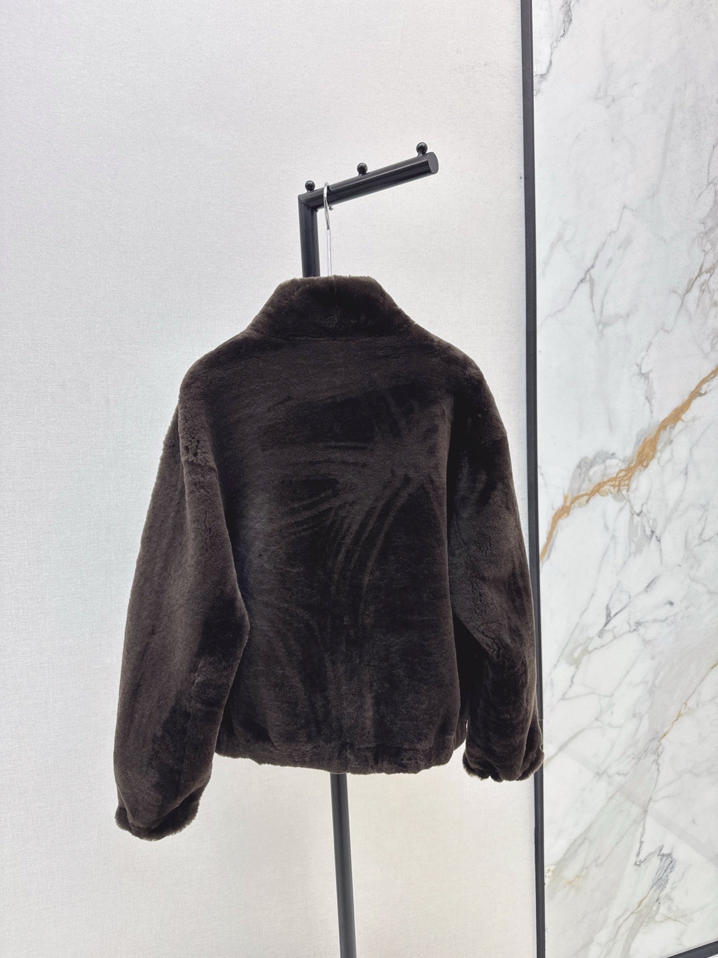 Fur coat with high collar