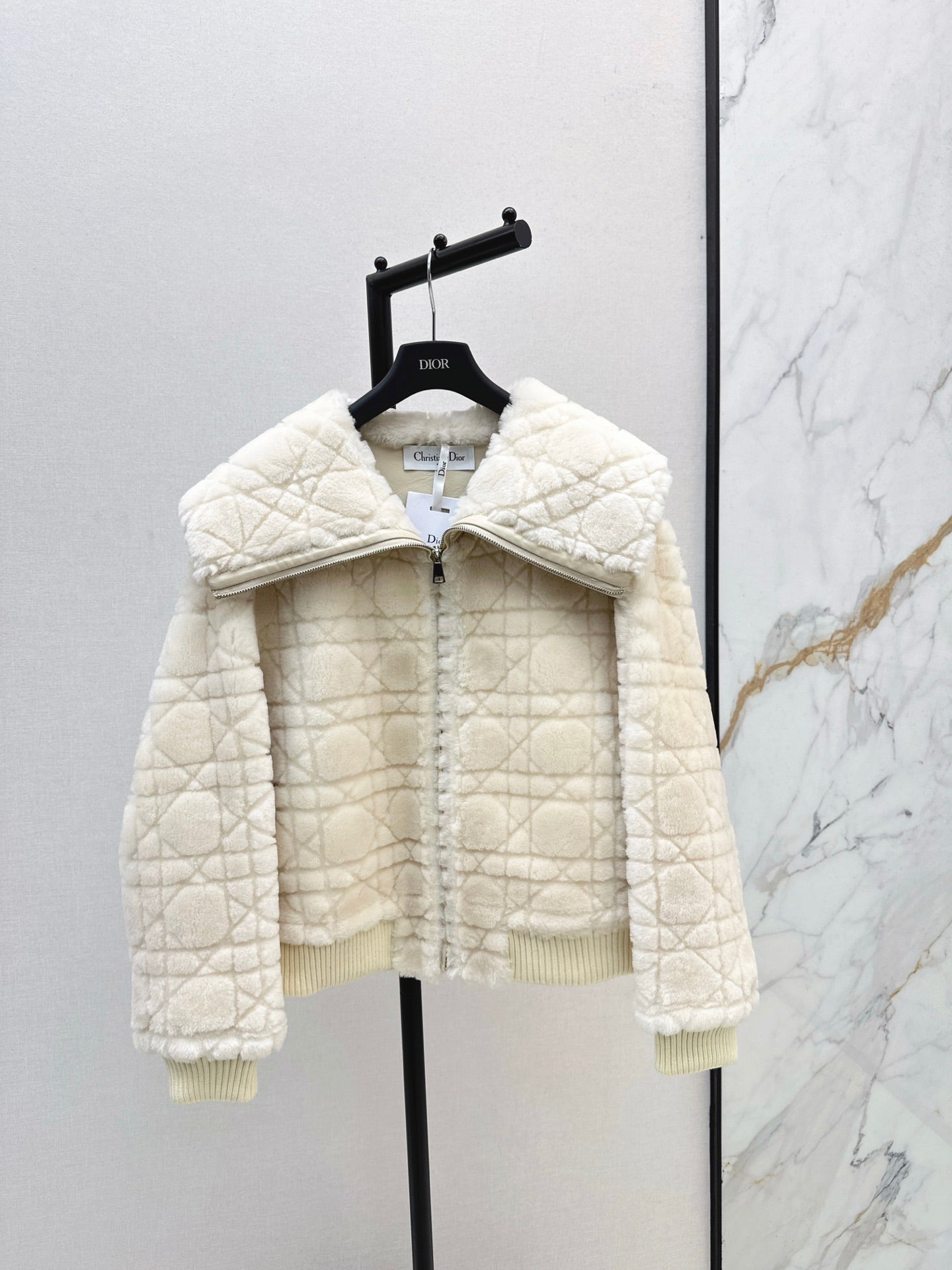 Check fur coat with large lapels