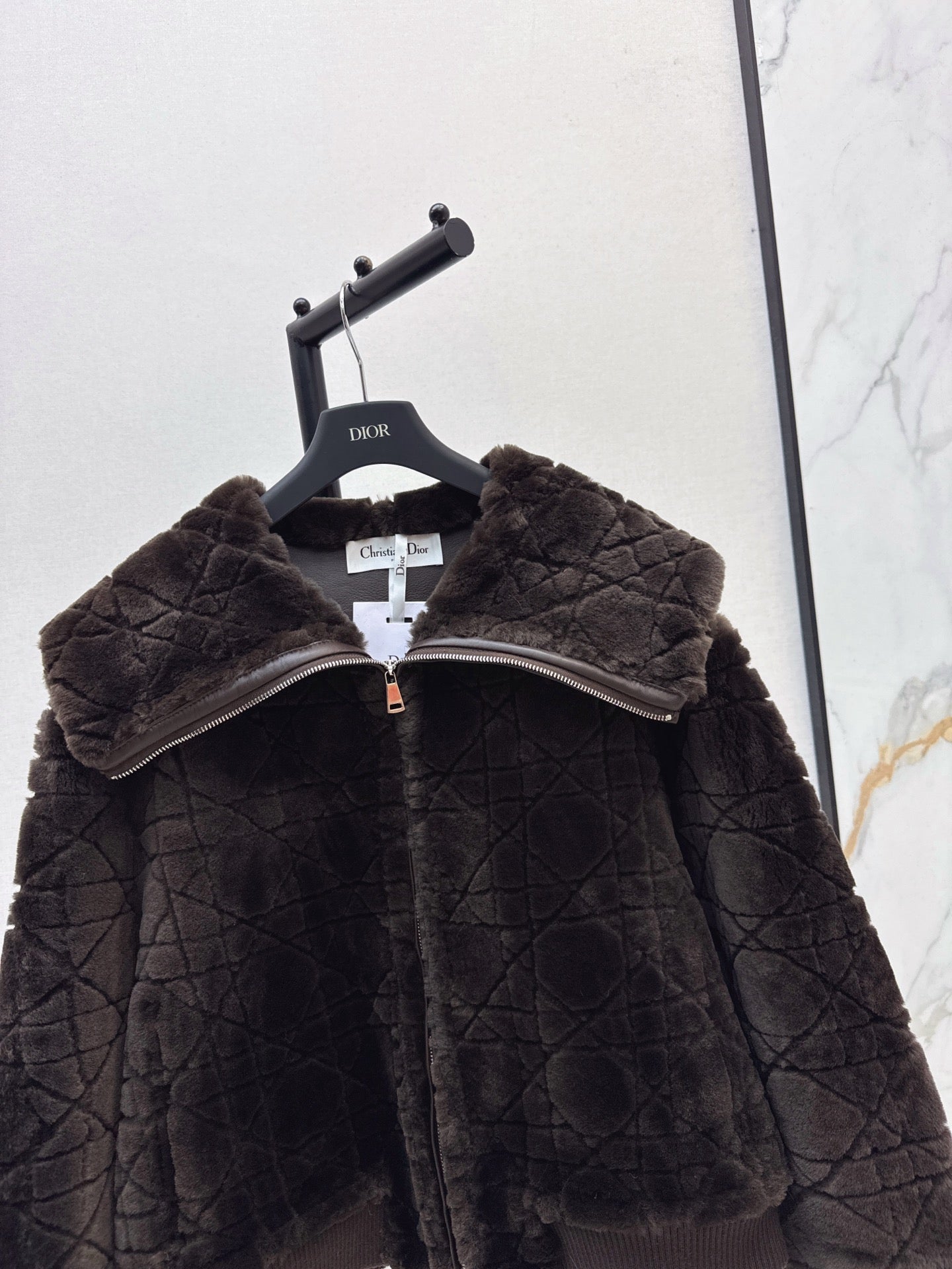 Check fur coat with large lapels