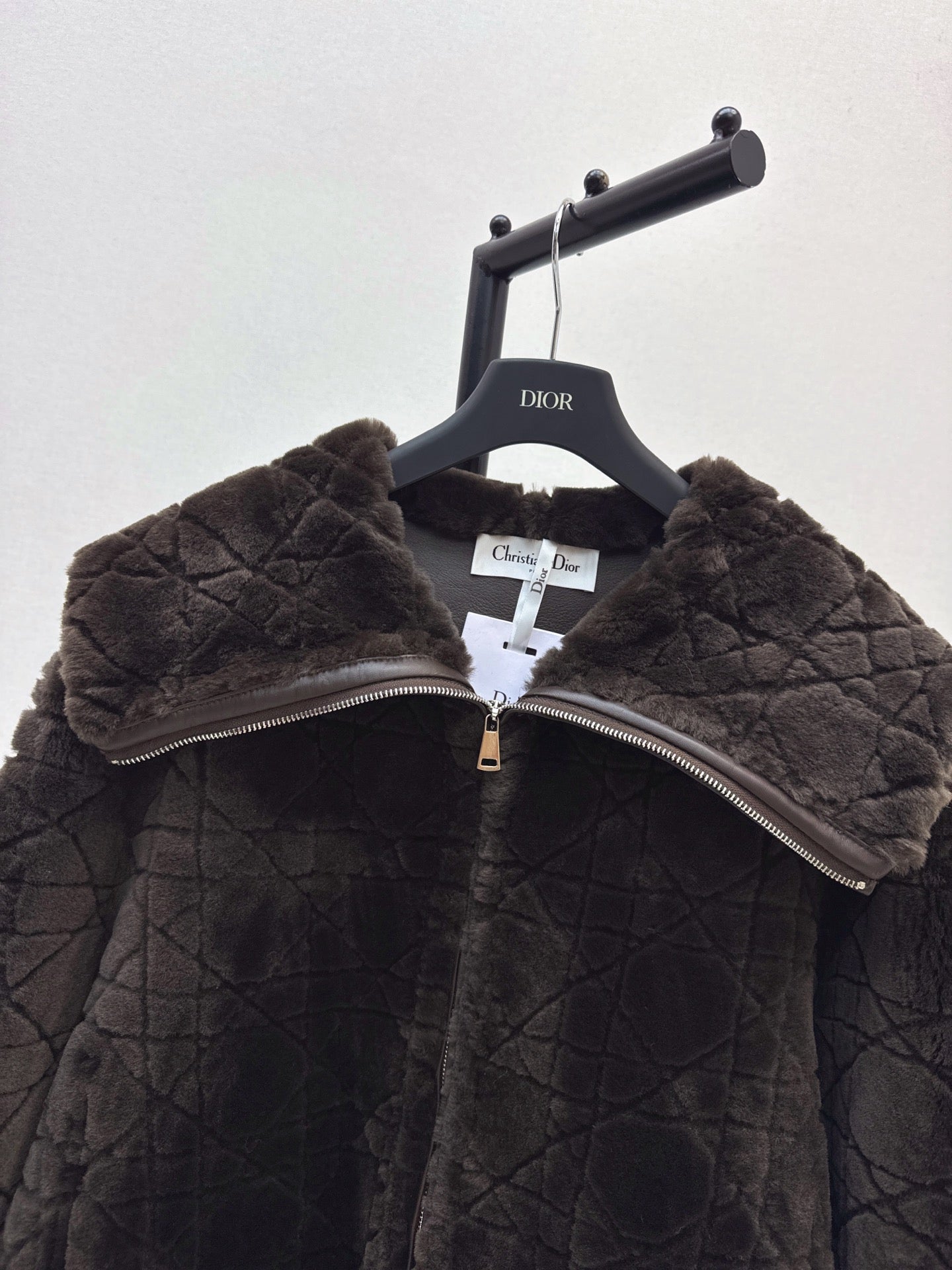 Check fur coat with large lapels