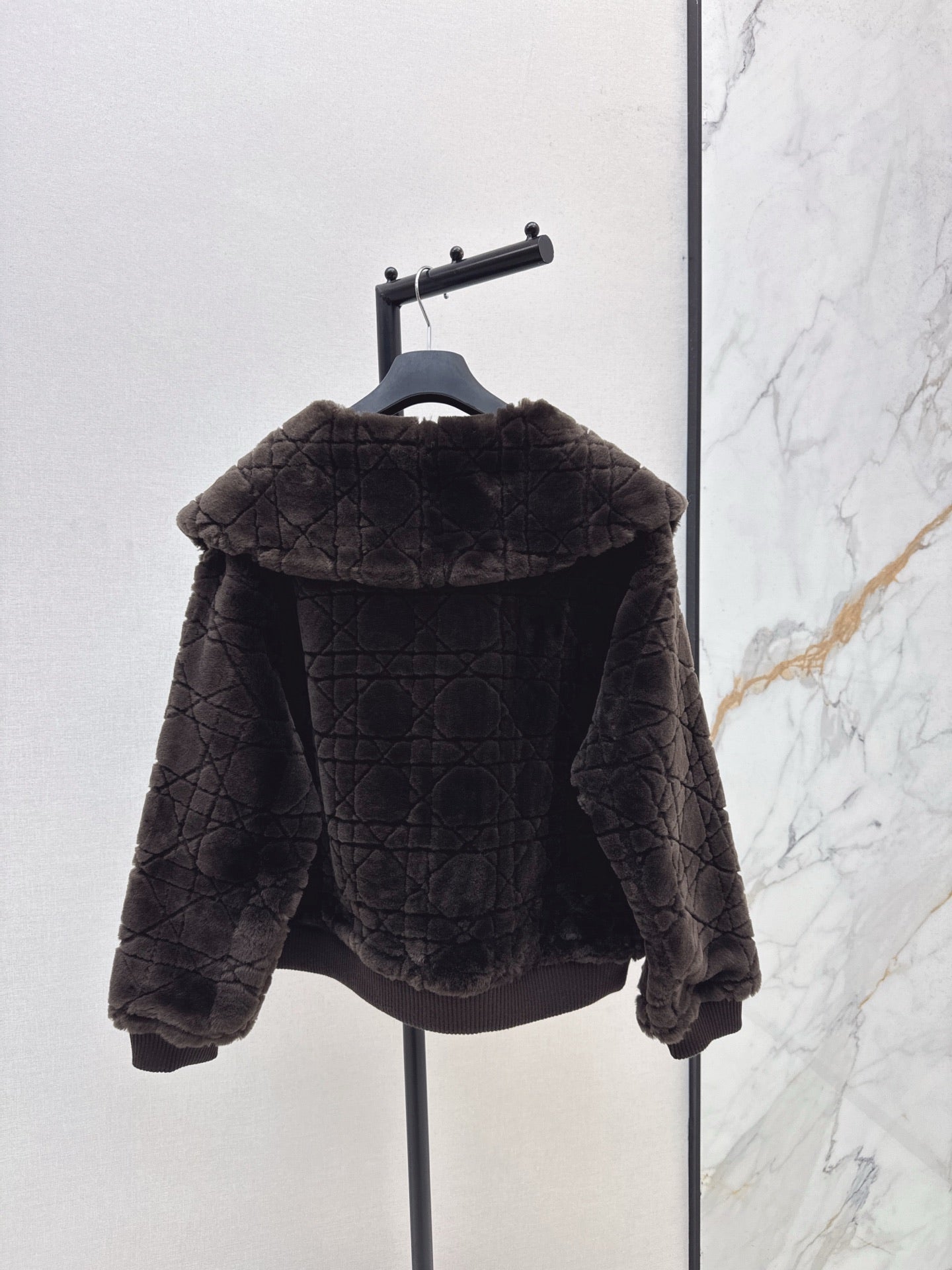Check fur coat with large lapels